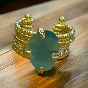 Handmade gold plated adjustable ring. Blue crystal.